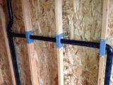Master bath plumbing above double sink