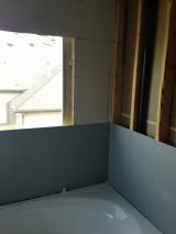 Sheetrock - above master bath, darker sheetrock for tiles to be assembled to