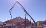 Pouring Cement Full Arm of Crane