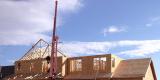 Crane Assembling Trusses top view of house and roof
