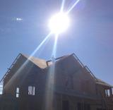 Silhouette in bright sky