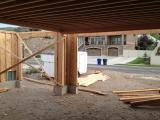 Standing in inside garage door looking out of garages to front street