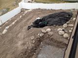 Water feature and faulty concrete pad removed ready for new pour