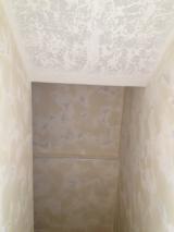 Texture plaster in stairs to basement