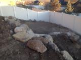 Lower rock wall and building pit