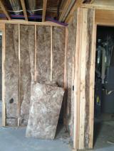 Basement furnace room to right and insulation to left
