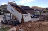 Dumper Dropping off Top Soil