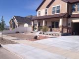 Fabric and Stones down around trees and shrubs
