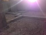 Basement Shell - View from back right showing doorway into Cold Storage on a very bright day