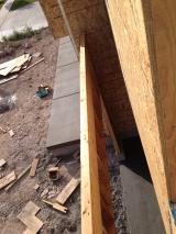 Viewed from 3rd bedroom looking down on front proch and into double garage