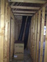 Upstairs hallway to 4th bedroom with ducting for roof