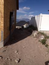 We need a fence here on front right side of house