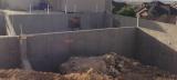 Basement Shell - View from front right showing back and side of Garages, Kitchen and Living Room to the back