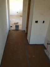 Floor covering for  hallway into master bath in preparation for paint spraying
