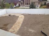 Flagstone from conrete pad to fire pit