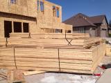 Building Roof Trusses - small ones on top of pile for garages and front of house