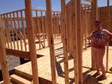 View from laundry room showing cut out where staircase banister will be